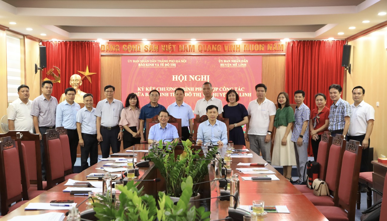UBND huyện Mê Linh và Báo Kinh tế & Đô thị ký kết chương trình phối hợp thông tin, tuyên truyền giai đoạn 2024-2025- Ảnh 1.