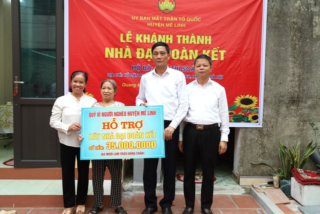 Ủy ban MTTQ Việt Nam huyện Mê Linh tổ chức Lễ khánh thành nhà Đại đoàn kết cho hộ cận nghèo tại thị trấn Quang Minh - Ảnh 1. Ủy ban MTTQ Việt Nam huyện Mê Linh tổ chức Lễ khánh thành nhà Đại đoàn kết cho hộ cận nghèo tại thị trấn Quang Minh - Ảnh 1.