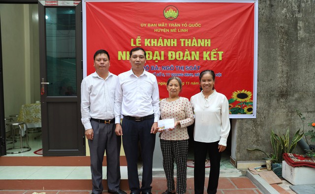 Ủy ban MTTQ Việt Nam huyện Mê Linh tổ chức Lễ khánh thành nhà Đại đoàn kết cho hộ cận nghèo tại thị trấn Quang Minh - Ảnh 2. Ủy ban MTTQ Việt Nam huyện Mê Linh tổ chức Lễ khánh thành nhà Đại đoàn kết cho hộ cận nghèo tại thị trấn Quang Minh - Ảnh 2.