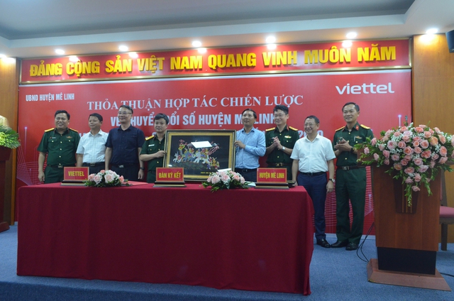 Lễ ký kết hợp tác về chuyển đổi số giữa huyện Mê Linh và Viettel Hà Nội - Ảnh 5.