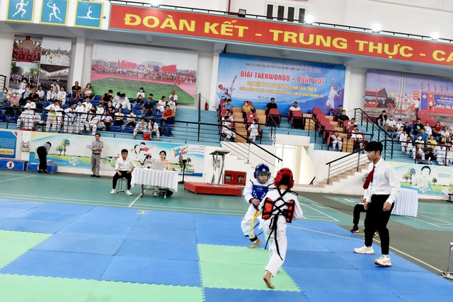 Sôi nổi giải Taekwondo Thiếu niên nhi đồng - Quần vợt Đại hội TDTT huyện Mê Linh lần thứ X, năm 2022 - Ảnh 4.