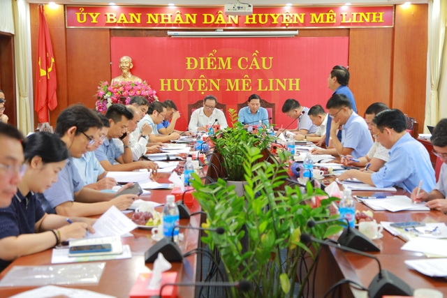 Sở Quy hoạch Kiến trúc Hà Nội làm việc với huyện Mê Linh về công tác quy hoạch liên quan đến tuyến đường Vành đai 4 và công tác quản lý quy hoạch trên địa bàn huyện - Ảnh 1.