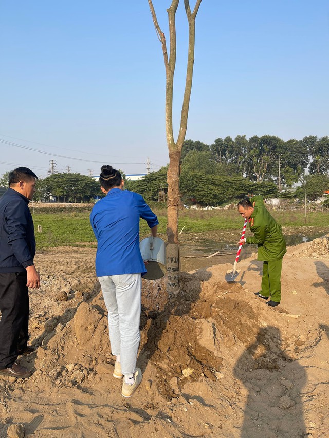 THỊ TRẤN QUANG MINH TỔ CHỨC LỄ PHÁT ĐỘNG TẾT TRỒNG CÂY “ĐỜI ĐỜI NHỚ ƠN BÁC HỒ” XUÂN QUÝ MÃO 2023 - Ảnh 11.