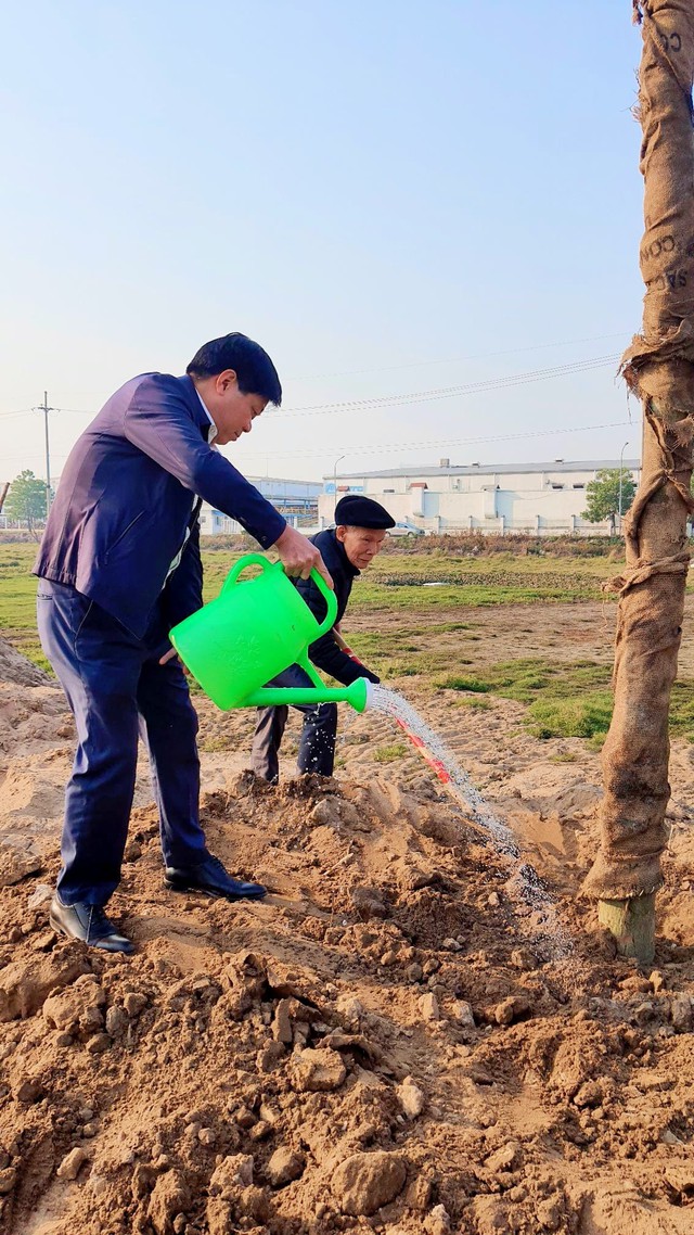 THỊ TRẤN QUANG MINH TỔ CHỨC LỄ PHÁT ĐỘNG TẾT TRỒNG CÂY “ĐỜI ĐỜI NHỚ ƠN BÁC HỒ” XUÂN QUÝ MÃO 2023 - Ảnh 4.