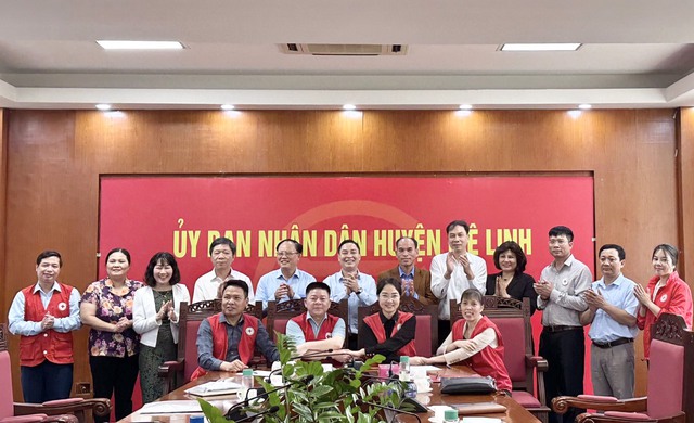 Cụm thi đua số 3 Hội Chữ thập đỏ Thành phố Hà Nội tô chưc Hôi nghi ký kết giao ước thi đua năm 2023 tại huyện Mê Linh - Ảnh 1.