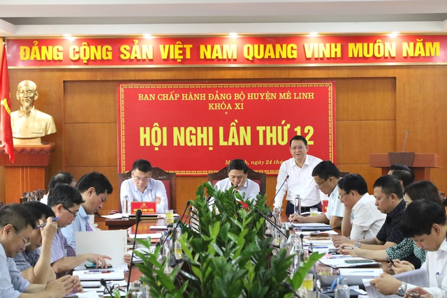 Hội nghị Ban Chấp hành Đảng bộ huyện Mê Linh lần thứ 12 - Ảnh 4.