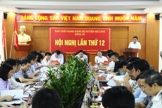 Hội nghị Ban Chấp hành Đảng bộ huyện Mê Linh lần thứ 12 - Ảnh 1.