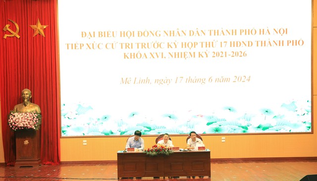 Đại biểu HĐND thành phố Hà Nội tiếp xúc cử tri huyện Mê Linh trước Kỳ họp thường lệ giữa năm 2024 HĐND Thành phố- Ảnh 1.